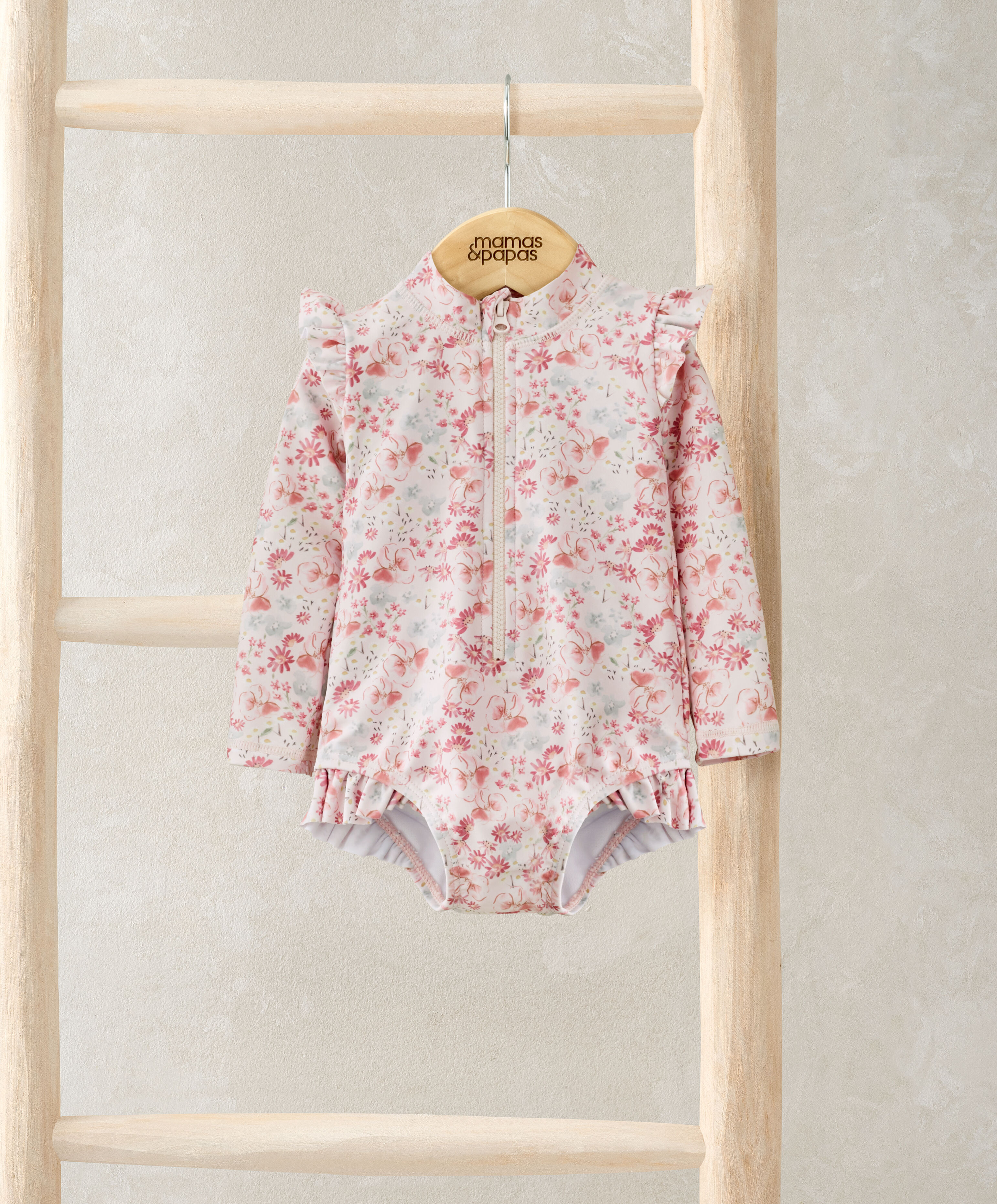 لباس سباحة بنقشة زهور وأكمام طويلة